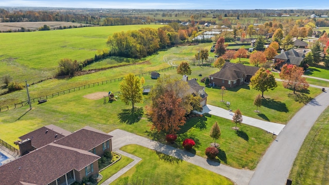 birds eye view of property featuring a rural view