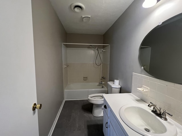 full bathroom featuring vanity, toilet, backsplash, and tiled shower / bath