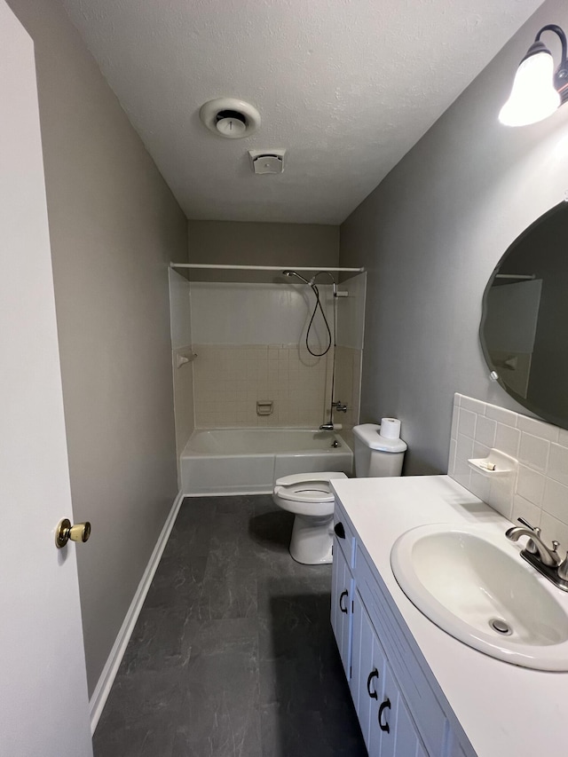 full bathroom with tasteful backsplash, vanity, a textured ceiling,  shower combination, and toilet