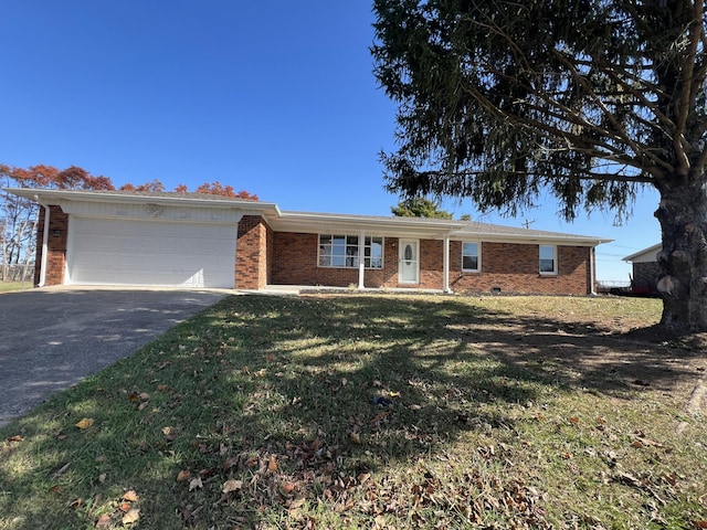 single story home with a front lawn and a garage