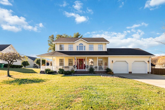 view of front facade featuring a front lawn, covered porch, and a garage