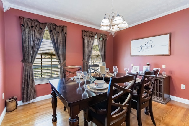 dining space featuring ornamental molding, hardwood / wood-style floors, and plenty of natural light