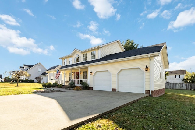 view of property featuring a porch and a front lawn