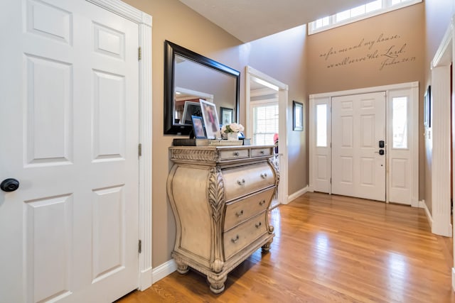 foyer with light hardwood / wood-style flooring