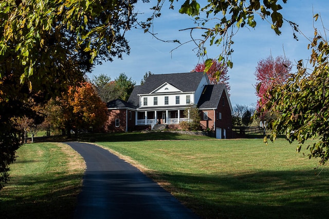 view of front of home with a front lawn