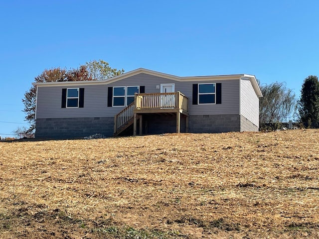 manufactured / mobile home featuring a deck