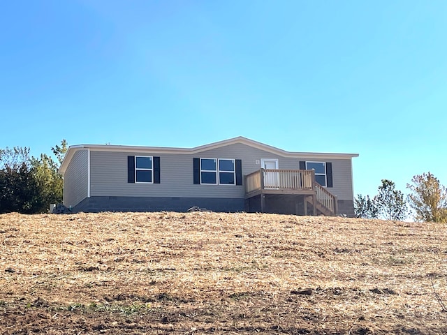 manufactured / mobile home featuring a deck