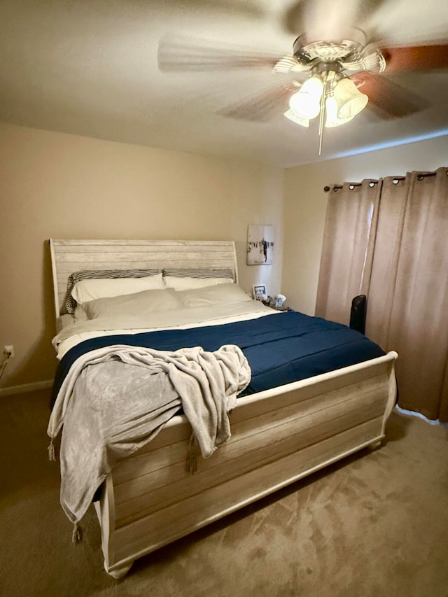 bedroom featuring carpet floors and ceiling fan