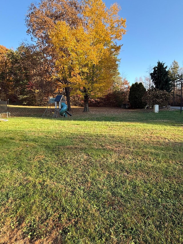 view of yard with a playground