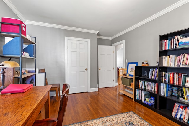 home office with ornamental molding and hardwood / wood-style flooring