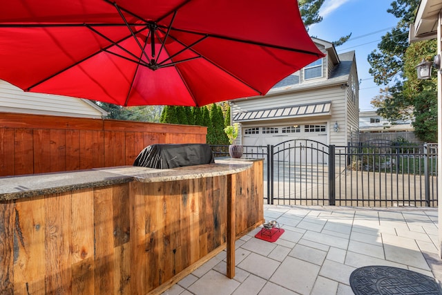 view of patio with a garage