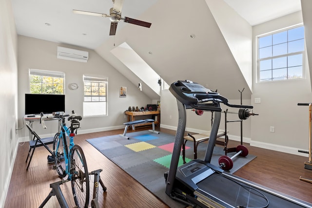 workout room with an AC wall unit, lofted ceiling, hardwood / wood-style flooring, and ceiling fan