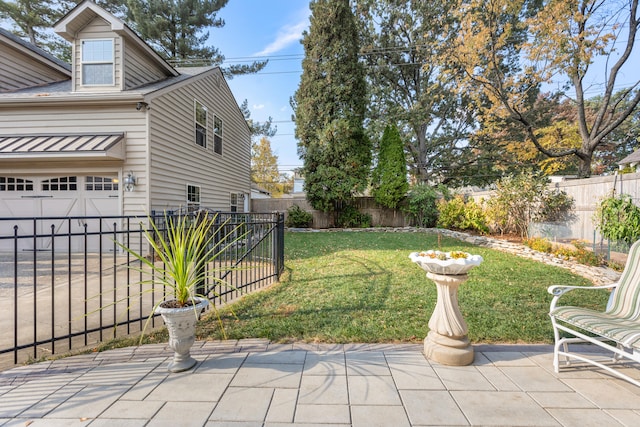 view of yard with a garage