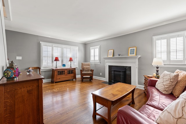 living room featuring crown molding and light wood-type flooring