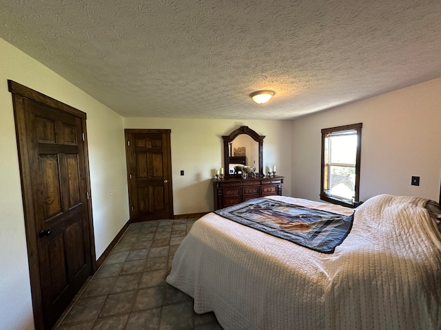 bedroom with a textured ceiling