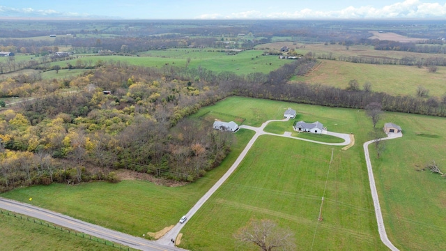 birds eye view of property featuring a rural view