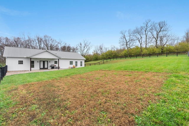 view of yard featuring a patio area and a fenced backyard