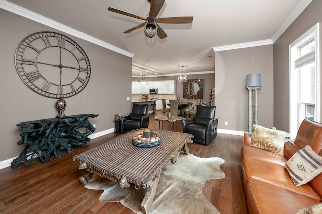 living room featuring crown molding, dark hardwood / wood-style floors, and ceiling fan