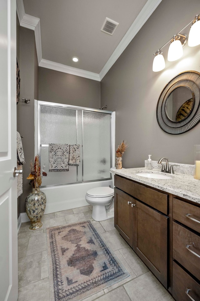 full bathroom featuring toilet, crown molding, bath / shower combo with glass door, and vanity