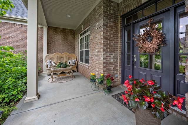 entrance to property with a porch