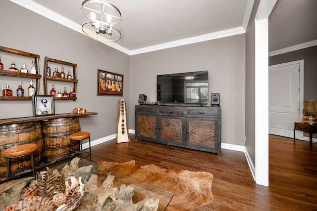 interior space with crown molding, dark hardwood / wood-style flooring, and an inviting chandelier