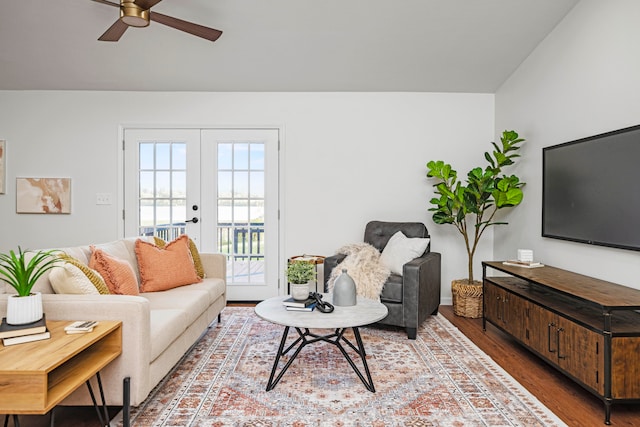 living room with french doors, ceiling fan, and wood-type flooring