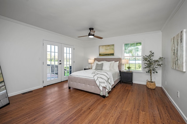 bedroom with ornamental molding, multiple windows, dark hardwood / wood-style floors, and ceiling fan