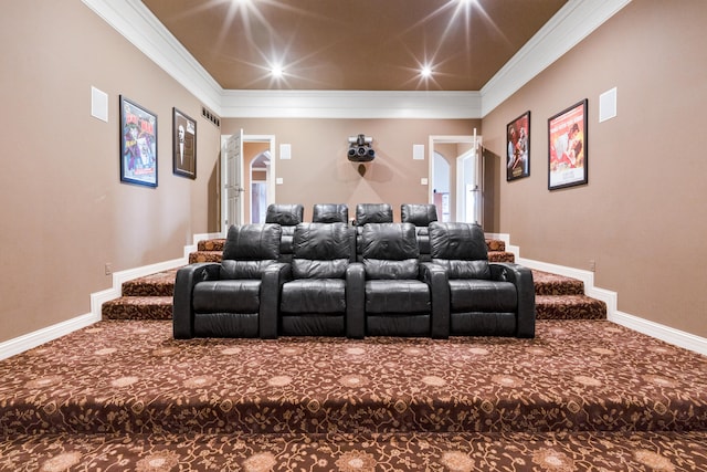 home theater room with ornamental molding