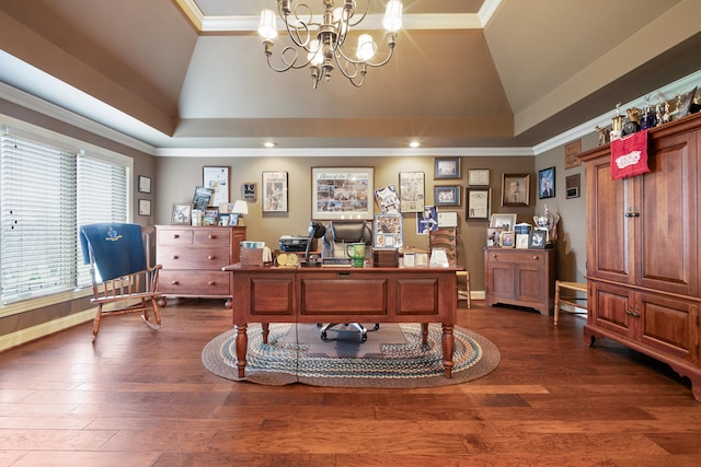 home office featuring dark wood-type flooring, lofted ceiling, and ornamental molding