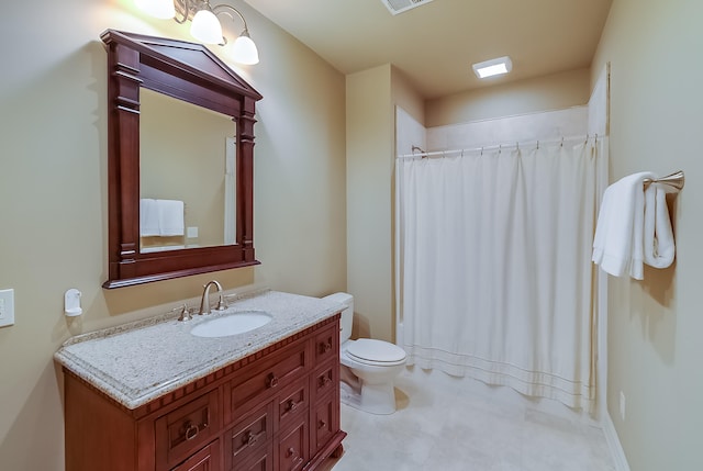 bathroom with vanity, toilet, and a shower with shower curtain