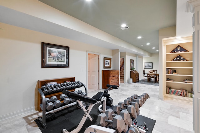 workout area featuring built in shelves