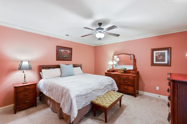 bedroom featuring ornamental molding, light carpet, and ceiling fan