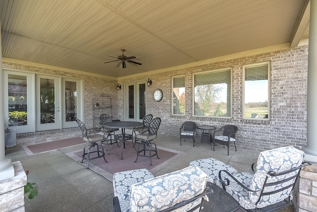 view of patio / terrace with ceiling fan and french doors