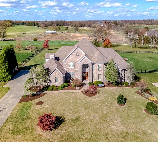 birds eye view of property featuring a rural view