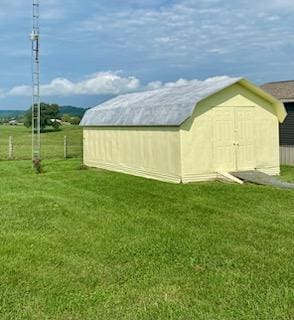 exterior space with a shed