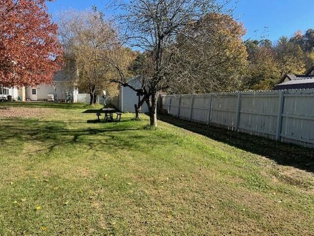 view of yard with fence