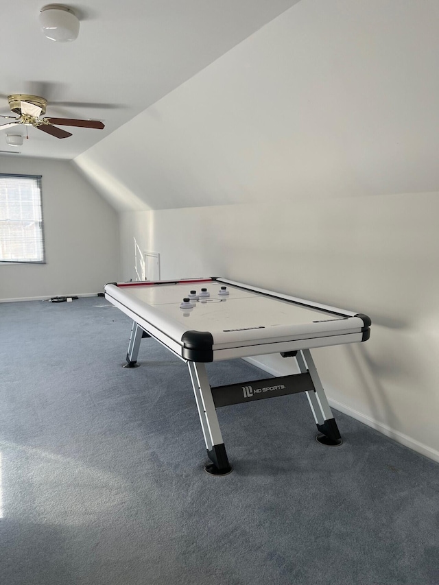 game room with carpet floors, lofted ceiling, ceiling fan, and baseboards