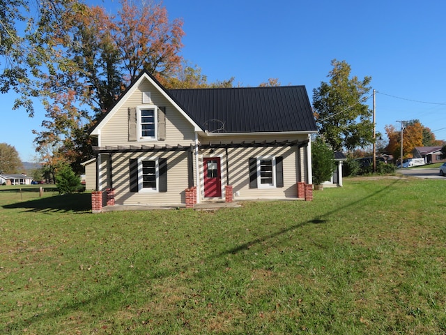 10 W Church St, Stanton, KY 40380 - back of property featuring a lawn and a metal roof