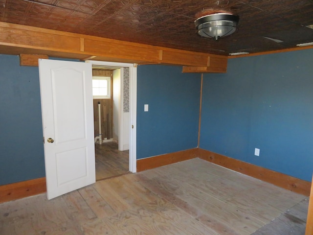 10 W Church St, Stanton, KY 40380 - empty room with an ornate ceiling and wood finished floors