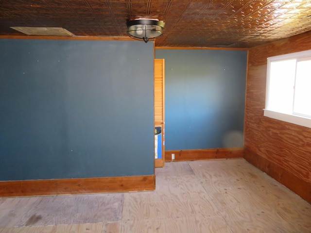10 W Church St, Stanton, KY 40380 - unfurnished room with an ornate ceiling and wood finished floors