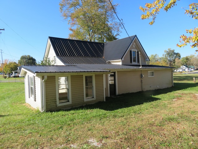 10 W Church St, Stanton, KY 40380 - back of house featuring a lawn and a metal roof