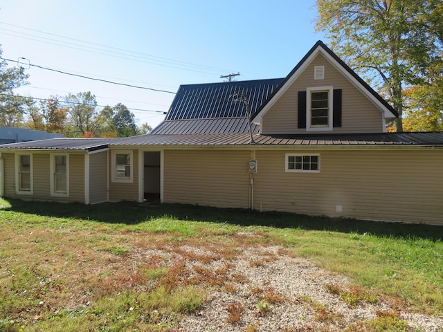 10 W Church St, Stanton, KY 40380 - rear view of house featuring a metal roof and a yard