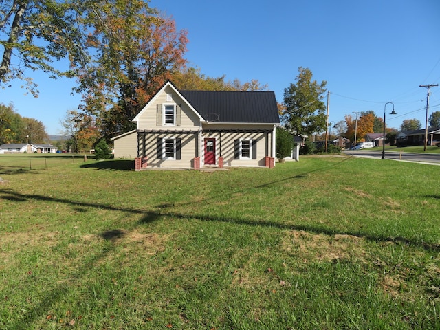 10 W Church St, Stanton, KY 40380 - view of front of house featuring a front lawn and a metal roof