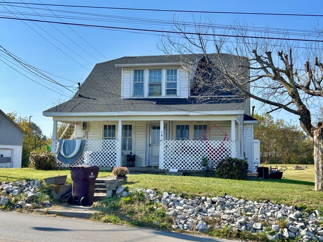 341 Langdon St, Somerset, KY 42503 - view of front of property with a porch, a front yard, and roof with shingles