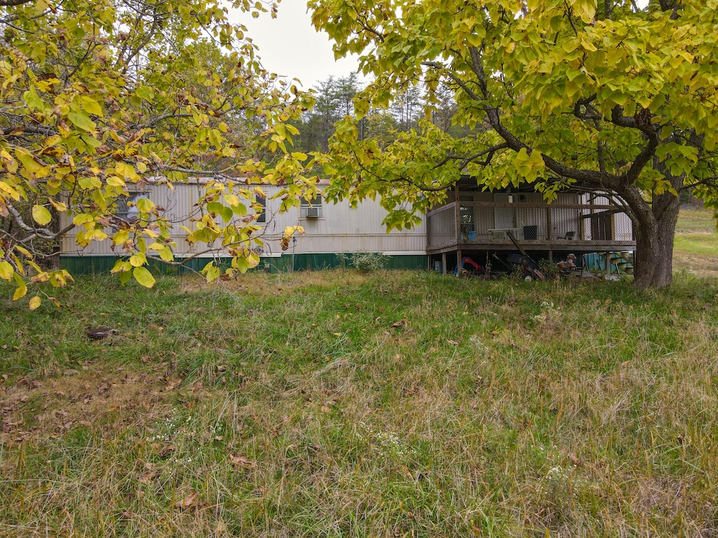 view of yard featuring a deck