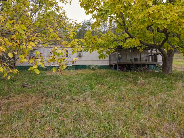 view of yard featuring a deck