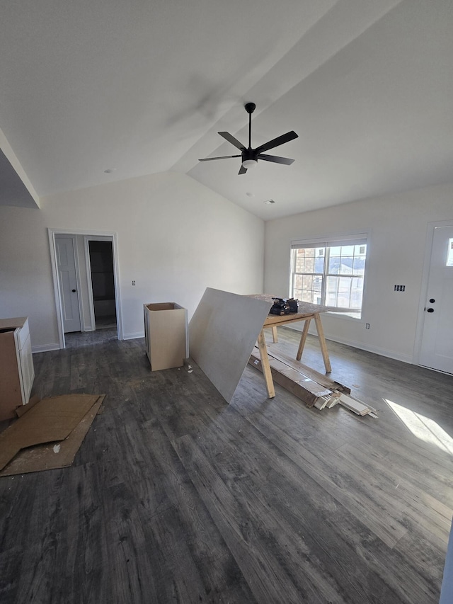 interior space with vaulted ceiling, dark hardwood / wood-style floors, and ceiling fan