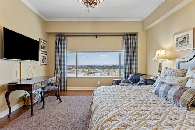 bedroom featuring a chandelier, wood-type flooring, and ornamental molding