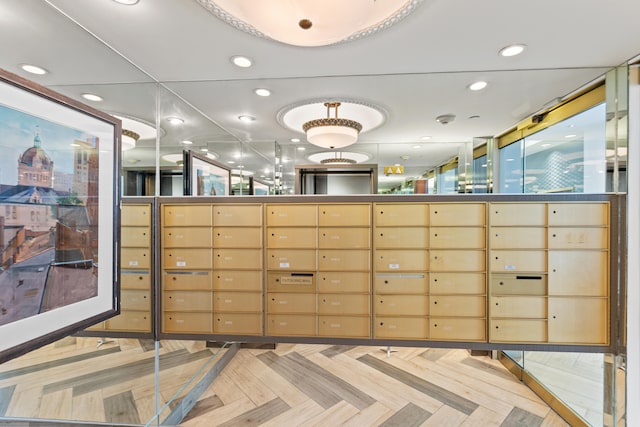 interior space featuring mail boxes and parquet floors