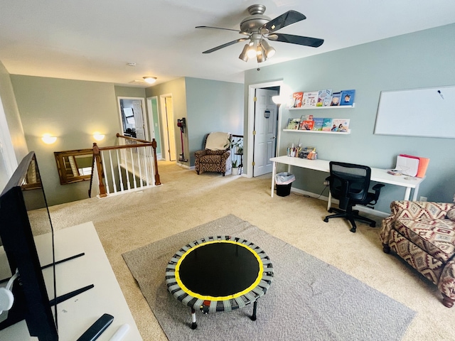 recreation room with carpet flooring